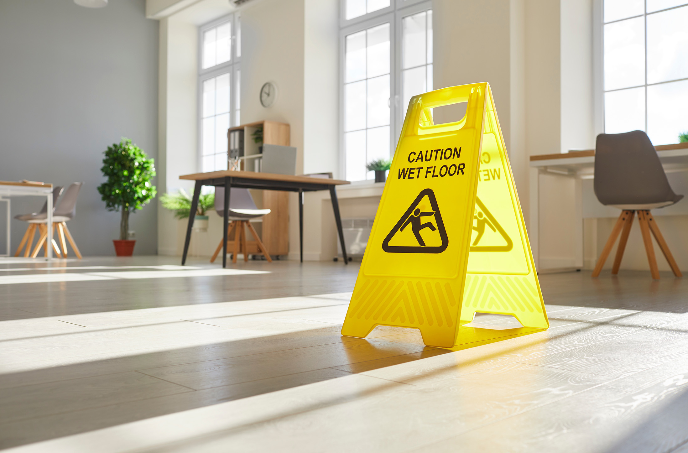 Yellow,Caution,Wet,Floor,Sign,Stands,On,The,Floor,In